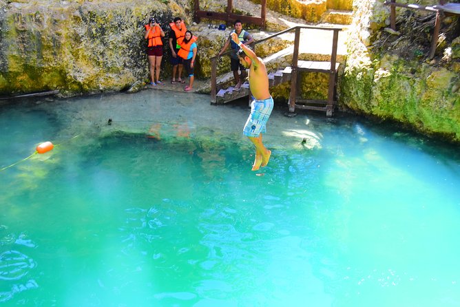 5-in-1 Adventure in Cancun: ATVs, Ziplines, Speed Boat, Snorkel and Cenote Swim - Cenote swim, cliff jump, and platforms