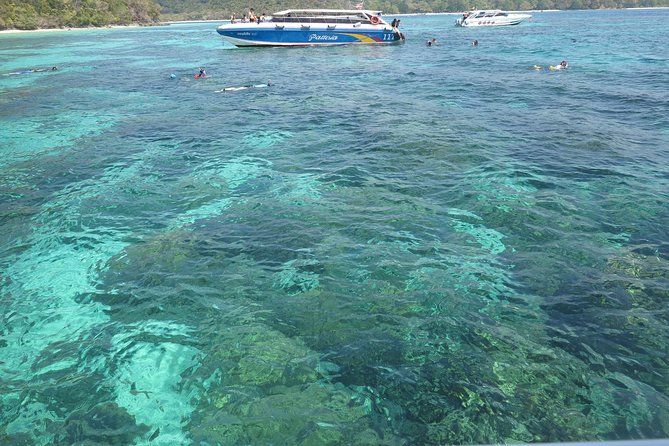 A full Day Haa & Rok islands from Koh Lanta( By Speed Boat) - Koh Haa’s cliffs and the final swim