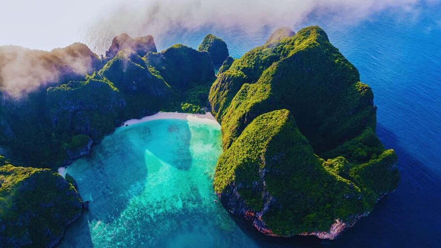 Ao Nang: Phi Phi Islands Speedboat or Catamaran Tour One day - Monkey Beach adds a lively moment