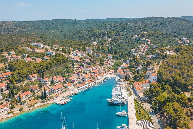 Blue Lagoon and 3 Islands Speedboat Tour from Trogir - Duga Cove on Ciovo: shade, pebbles, and warm water