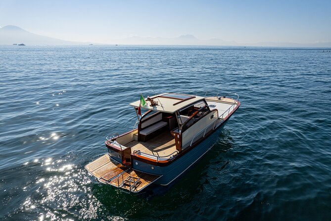 Capri Island Private Luxury Boat – Exclusive Scenic Day Tour - Capri from the sea: grottos, cliffs, and rock arches