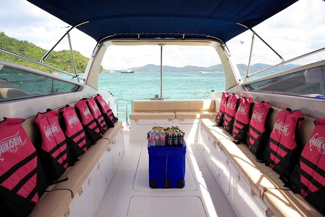 Coral Island by Speed boat from Phuket - The Coral Beach Club: sand, swimming, and a chair