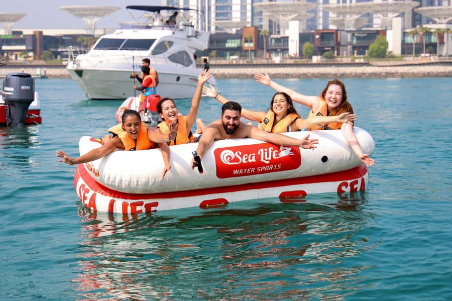 Dubai: Speedboat-Pulled Donut Ride Trip in JBR - Meeting at Dubai Harbour’s Dockmaster D1