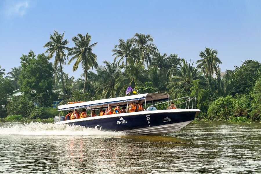 From Ho Chi Minh: Cu Chi Tunnels and VIP Speedboat Tour - Leaving Ho Chi Minh City on the Saigon River