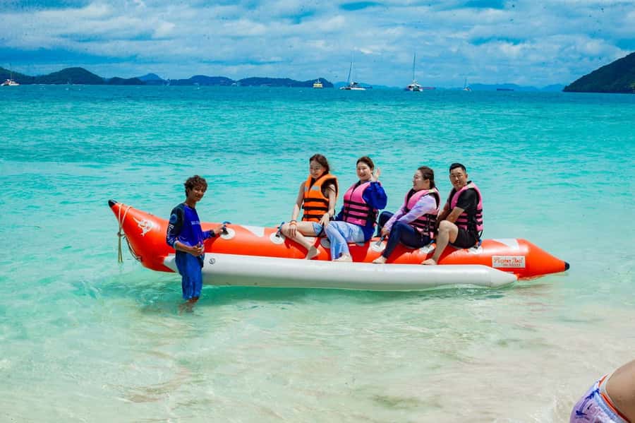 From Phuket: Coral Island Kahung Beach Speedboat Trip - Snorkeling, swimming, and optional sea sports