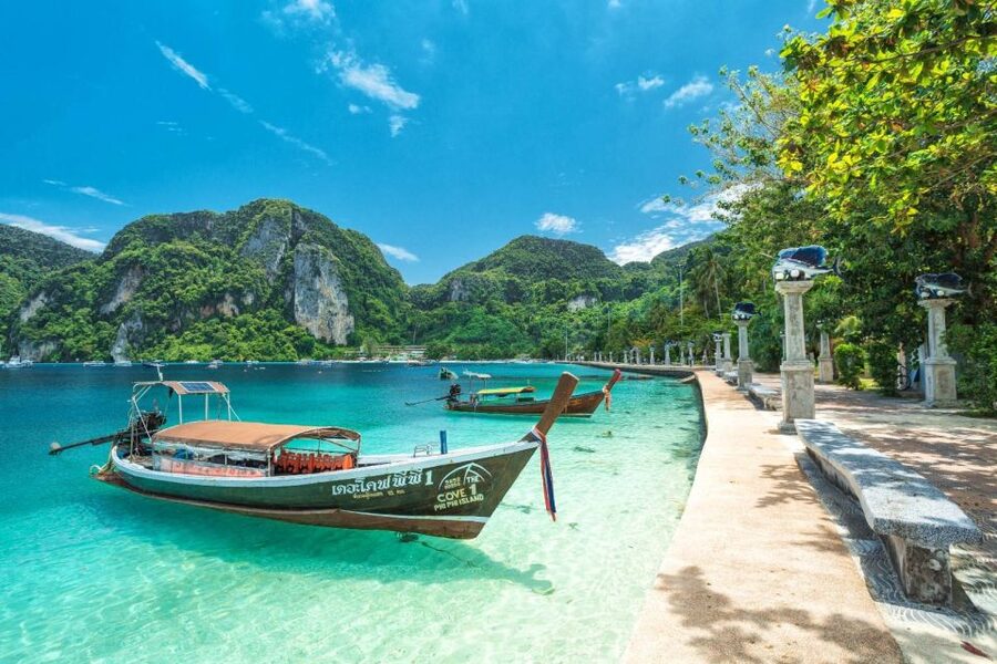 From Phuket: Phi Phi and Khai Islands Speedboat Tour - Pileh Lagoon and its steep limestone walls