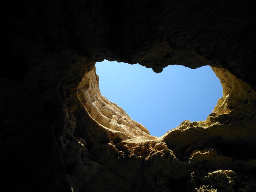 From Portimão: Benagil Caves Guided Speedboat Tour - Guide commentary and the human side of the trip