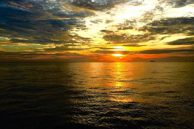 Full Day & Sunset Phi Phi Islands Tour From Phi Phi by Speedboat - Nui Bay and Viking Cave add scenery and local detail