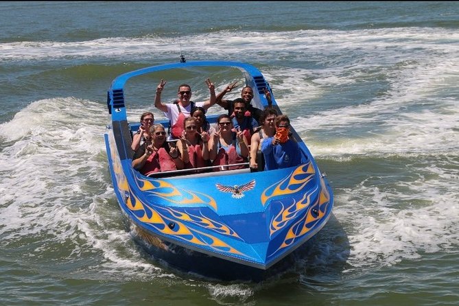 Galveston Suntime Jet Boat Thrill Ride - Dolphins and waterfront views add a second layer
