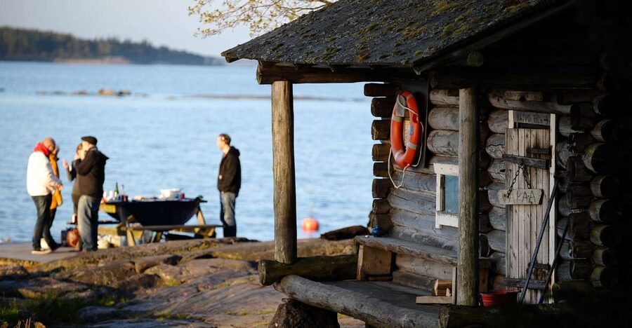 Helsinki: Archipelago RIB Boat Tour with BBQ Lunch and Sauna - Walking ashore and looking back to the Ice Age