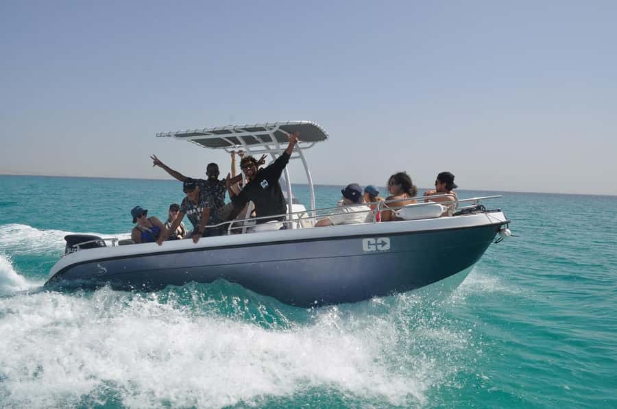 Hurghada: Private Speedboat Adventure with Snacks & Pick-up - Snorkeling over coral reefs and marine life