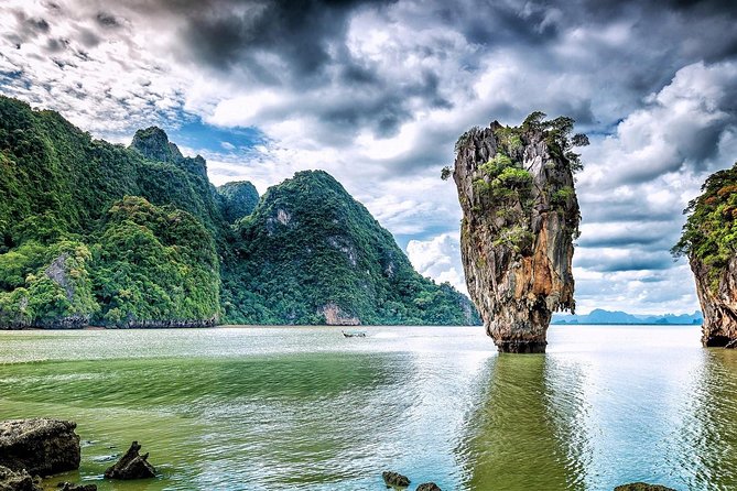 James Bond Island Adventure: Speedboat & Canoe Expedition - Canoeing beneath the limestone cliffs