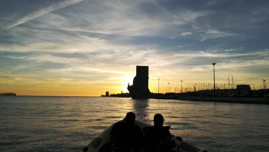Lisbon Speedboat Sunset with Monuments Sightseeing - Alfama, Commerce Square, and the old city from below