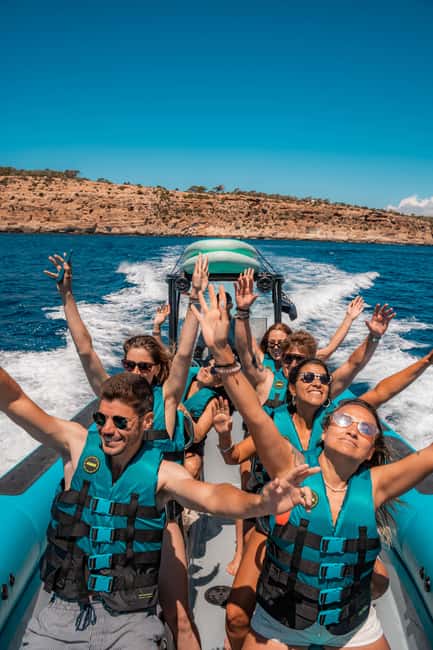 Mallorca: 2h speedboat tour, visit caves, cliffs and snorkel - Palma Cathedral and the coast from the sea