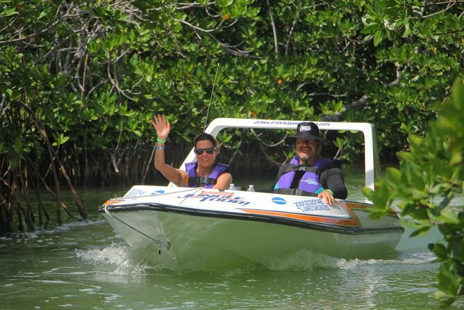 Mangrove and Lagoon Speed Boat Tour - Taking the wheel on Nichupté Lagoon