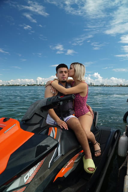 Miami: Jet Ski Adventure with Complimentary Speed Boat Ride - A boat ride past Miami’s waterfront mansions
