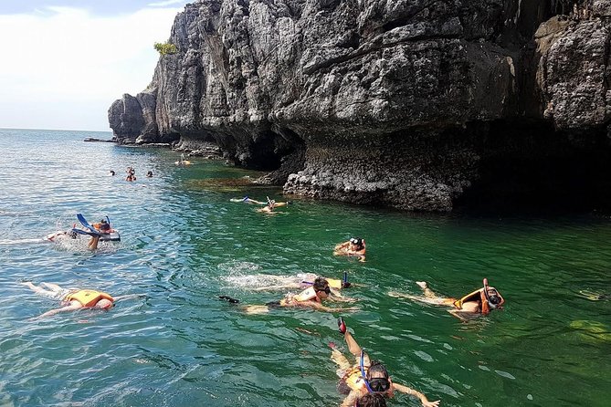 Mr. Tu Day Trip to Angthong Marine Park by Speed Boat from Koh Samui - Kayaking through caves and sheltered water