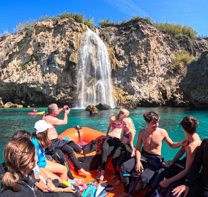 Nerja-Maro: Snorkeling & Sea Scooter Speedboat Trip - Speeding out from Burriana Beach