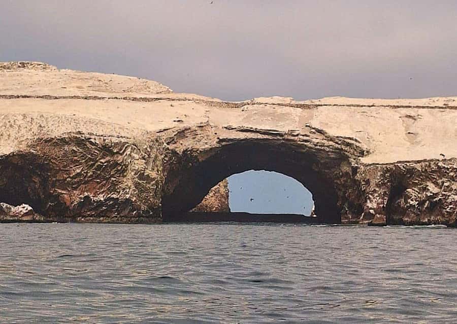 Paracas: Tours to Ballestas Islands by Speed Boat - The Candelabro geoglyph from the water