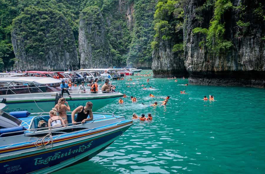 Phi Phi: 7 Islands Speed Boat Tour with Sunset and Plankton - Loh Samah Bay leads to Maya Bay