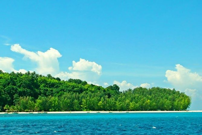 Phi Phi & Bamboo Islands Full-Day Tour by Speedboat From Phuket - Pileh Lagoon, where the water gets personal