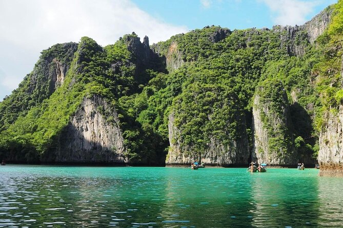 Phi Phi Islands Adventure Day Tour by Speedboat from Krabi - Viking Cave is a boat-side history lesson