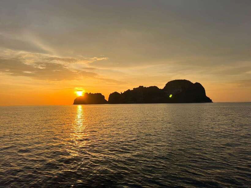 Phi Phi: Sunset and Plankton by Speed Boat with Snorkeling - Viking Cave and the storybook rock walls