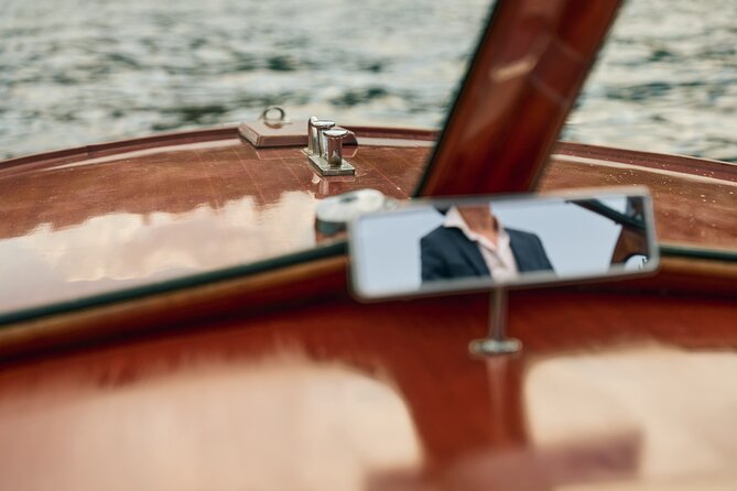 Private Lake Como Wooden Speedboat Tour with Aperitif - Menaggio and Santa Maria Rezzonico show a quieter shore