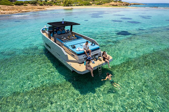 Private Luxury Powerboat Day Tour in Athens - Greek snacks, wine, and practical comforts
