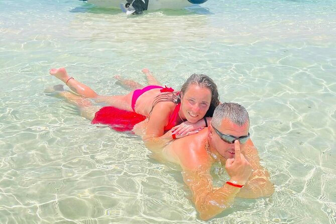 Private Speed Boat 4 Hours to White Island and Dolphin House - Orange Bay, Paradise Island, or another island stop