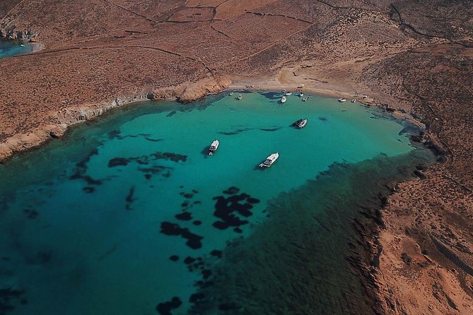 Private Speedboat Cruise from Delos to Rhenia and Mykonos - Psarou and Mykonos’ south coast from the water