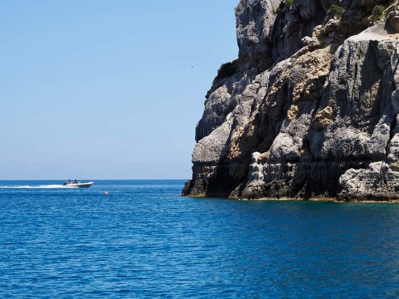 Rhodes: RIB Cruise with Drinks and 4 Swim Stops - Traganou’s gravel shore and rocky caverns