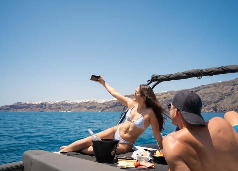 Santorini: half day exclusive speedboat cruise - From Thera to Ammoudi by air-conditioned van