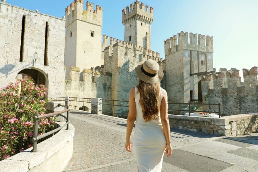 Sirmione: Walking and Speedboat Tour - Crossing the Bridge Into the Walled Center