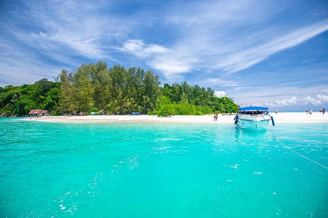 Snorkeling Phi Phi Islands Tour From Phi Phi by Speedboat - Viking Cave and the Phi Phi scenery from the water