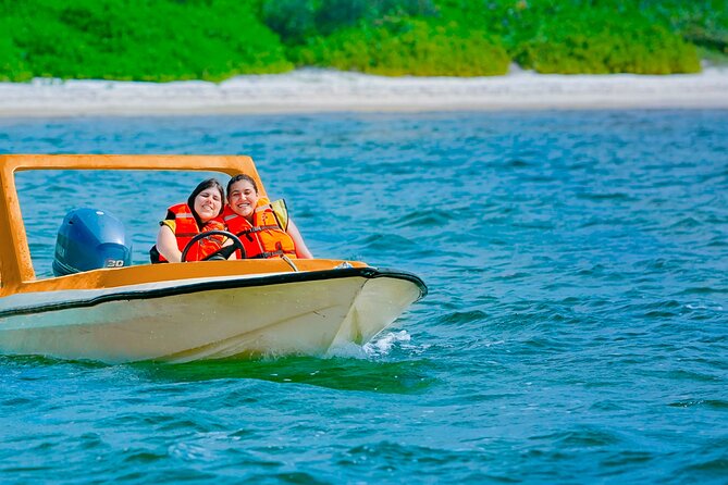 Speed Boat Snorkeling and Beach in Cozumel - Taking the wheel at Barracuda Beach Club