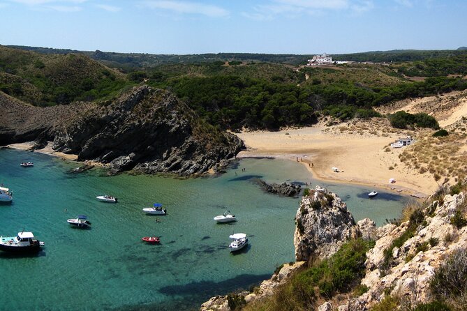 Speedboat excursion through the coves of northern Menorca - Cala Pudent: fish, sand, and Posidonia