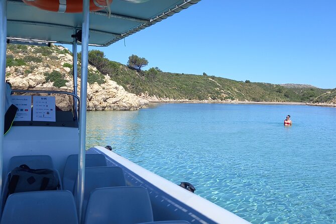 Speedboat excursion through the coves of northern Menorca - Favaritx Lighthouse and the slate coast