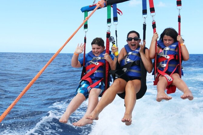 Speedboats and Parasailing Combo - A party cruise with snorkeling and a floating bar