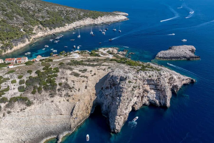 Split: Blue Cave & Hvar Small-Group Speedboat Tour - Komiža: the most authentic stop on Vis