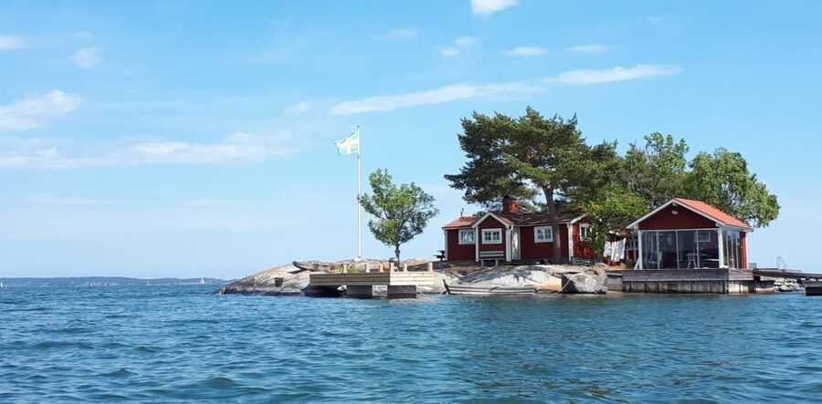 Stockholm Archipelago RIB Speed Boat Tour with Swedish Fika - Slowing near Vaxholm Fortress