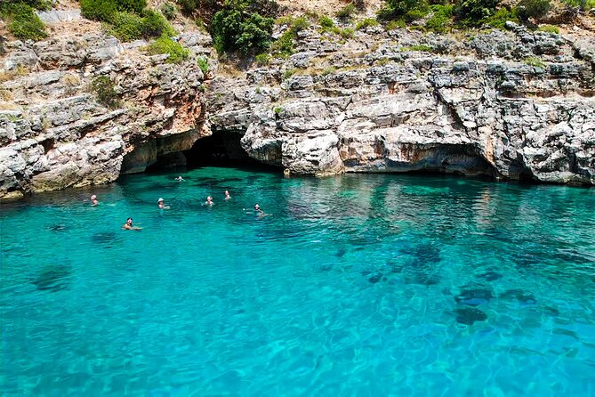 Vlore: Dafina Bay and Haxhi Ali Cave Private Speedboat Tour - Bristan Bay combines nature with communist-era defenses