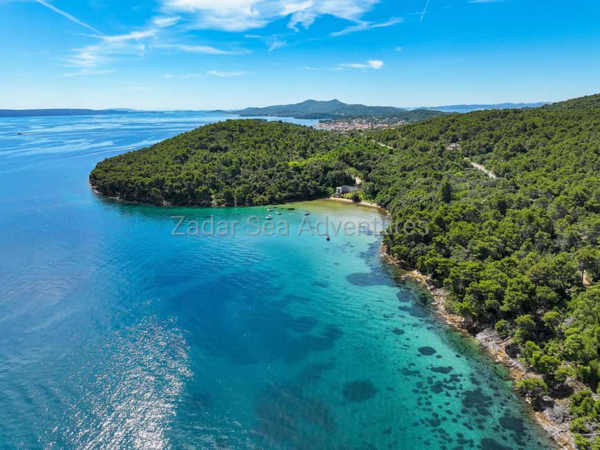 Zadar: Island Hopping Speedboat Adventure with Aperol Spritz - Stop one: a quiet cove for swimming and snorkeling